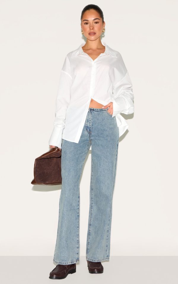 a673f70af6a9c62cba0102406338d15432a635dd_CNL5656_1_vintage_wash_low_rise_no_waistband_straight_leg-1