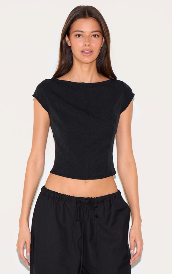 a6951081c355133d7a37f5b8e3109c4d15cdb88f_CNL7499_1_black_woven_boatneck_top-1
