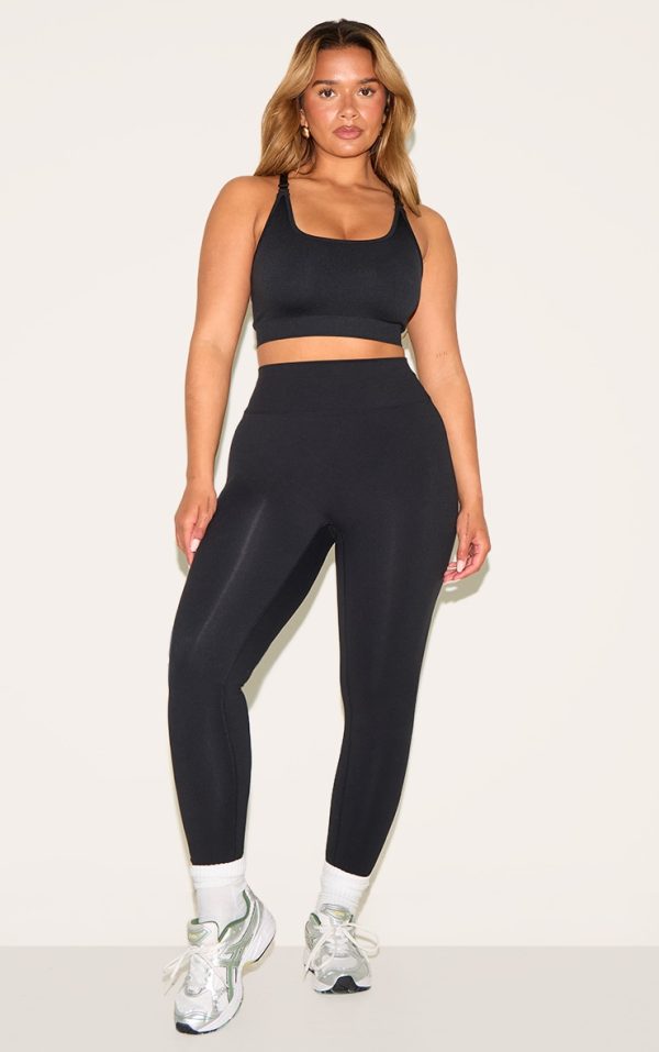 a696d53d21c7db6bacb6e6390f9e9e7d5e346d4b_CNM8521_3_shape_black_seamless_active_cupped_sports_bra