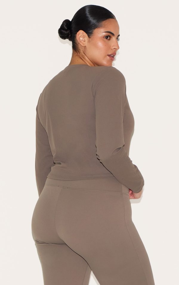 a7bc9f6d10834b52a7ca242ee5e4d89a2e1a1707_CNC2089_7_brown_sculpt_long_sleeve_gym_top