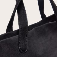 a7f44521a7262cf1d77a9476e52bb3bfefab67b0_CNL9836_3_black_faux_suede_elongated_hand_bag