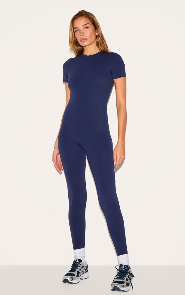 a8d26bf7a52463b497f5bf53115cf458f5b00eea_CNL6906_3_navy_sculpt_short_sleeved_unitard