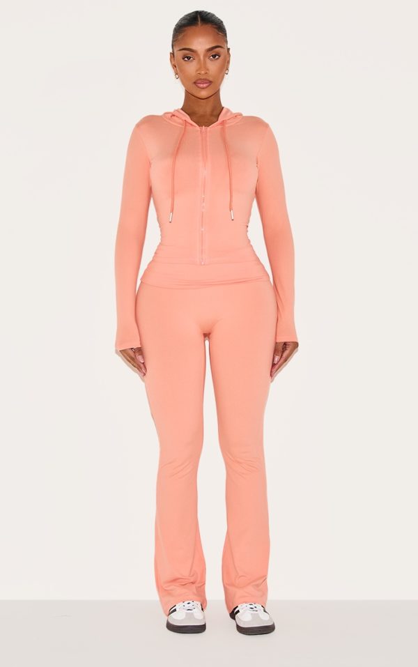 a900f564adcd6964c7d25c0c7df400fbbdc1169b_CNM1097_3_shape_peach_sculpted_zip_through_hoodie