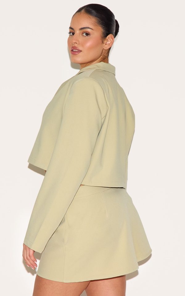 a9ee565c1cbb84164a5b274834c2e17d1d008c0b_CNM5657_2_plus_sage_green_tailored_woven_boxy_cropped_bow_detail_blazer