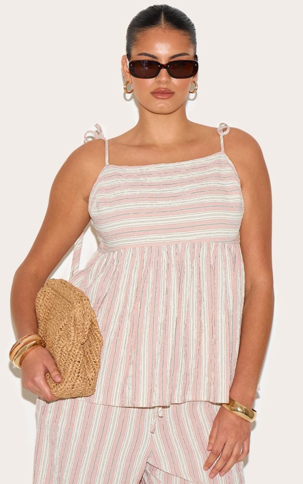 aa4fa3ffce3e93c4c73ee3192273fc77a04b12c2_CNM3419_1_plus_pink_woven_textured_striped_floaty_top