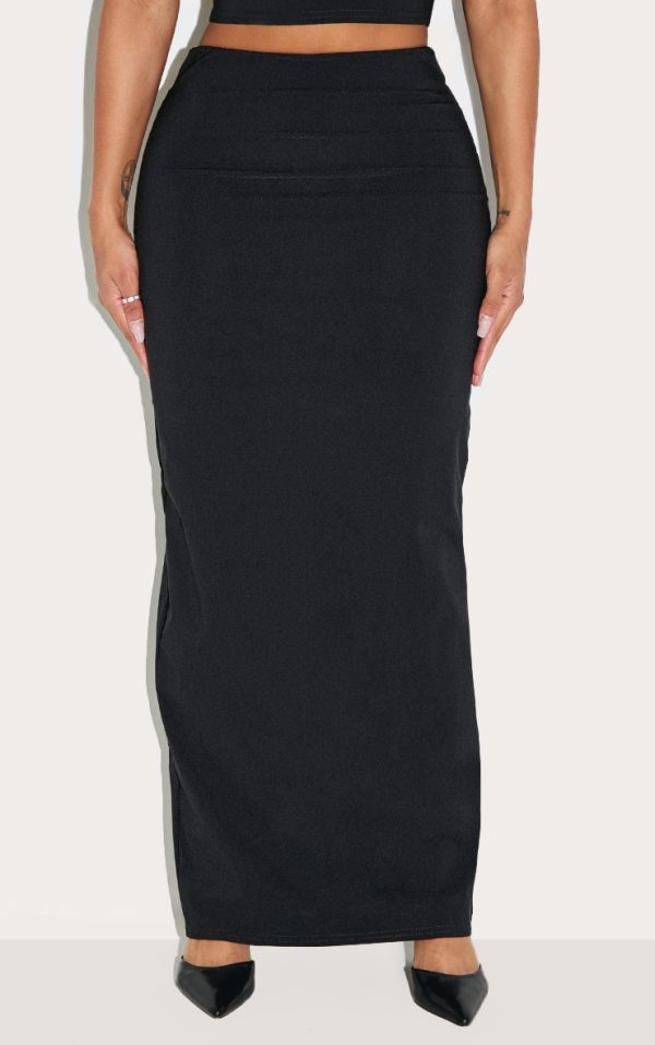 aa8f03d9697dab5a619acc203fbded2fb5305a10_CNM1028_2_shape_black_stretch_woven_high_waisted_maxi_skirt
