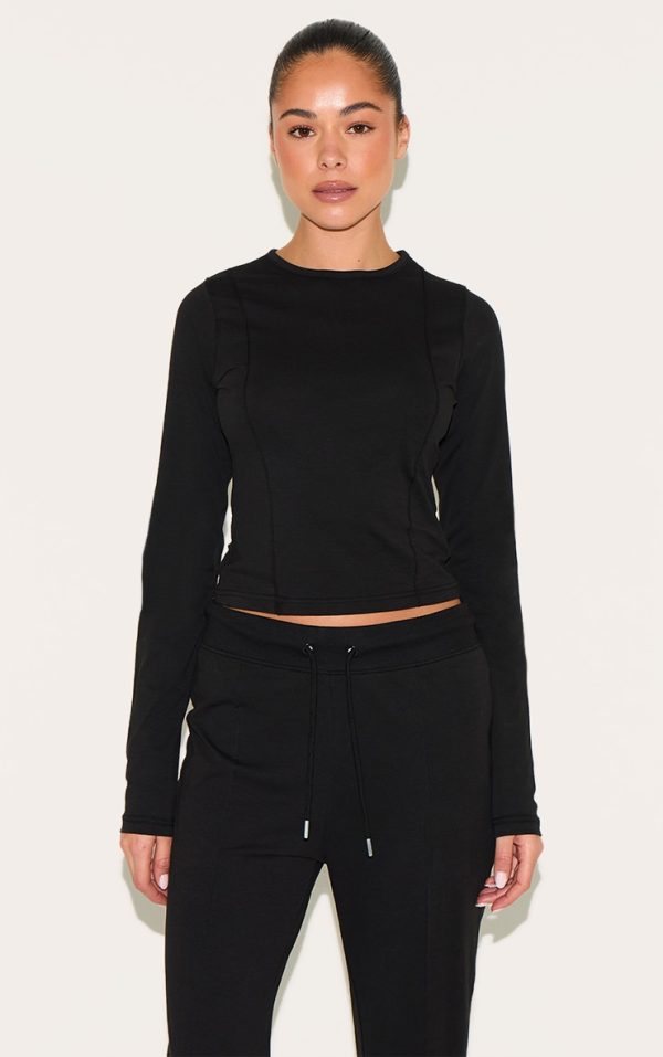 abae0f138b80144d9c16b54e9c6dd9f99264b3c1_CNM2915_1_black_cotton_seam_detail_long_sleeve_top
