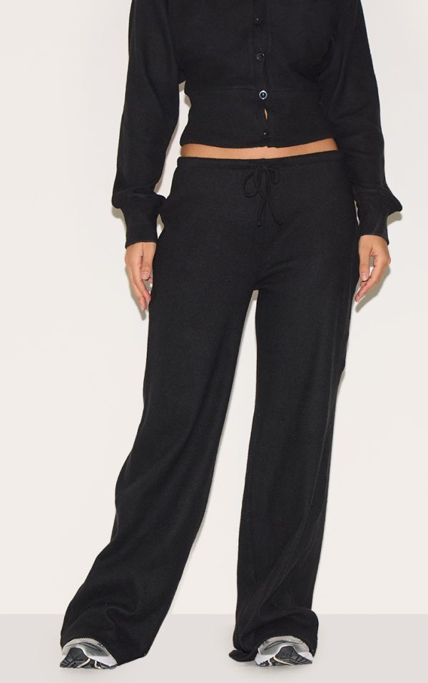 ac74803665a6a9342180e28541864a8133c4eb16_CNM5261_2_black_soft_ribbed_low_rise_wide_leg_trousers