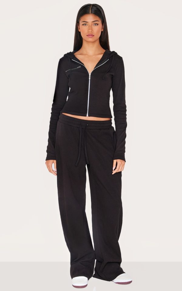 ac92e6bc96f251951dbcc8faeeee81c100cb724d_CNL4855_3_black_zip_up_ribbed_track_top-1