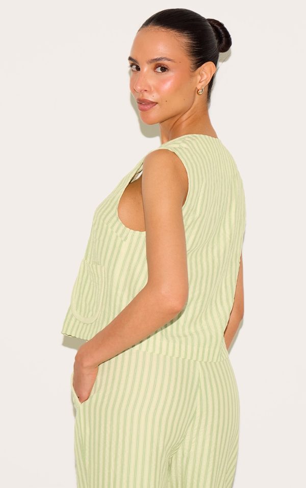 aca37c9b451c7ef119e95c57b4d66b156cfab0ae_CNM9055_2_petite_olive_striped_woven_tie_front_longline_waistcoat
