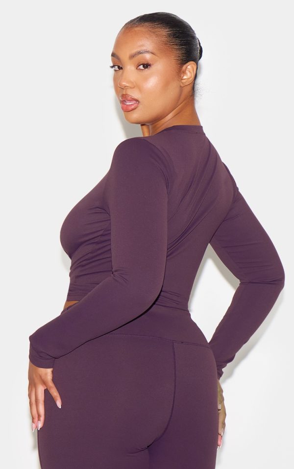 ad3c9a8c1652a09c1c3e027483369862c9e39ca6_CNL7880_7_dark_plum_sculpt_long_sleeve_crop_gym_top-1