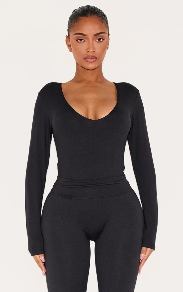 ae034618d87ff2e7b999937725ab7aea742d3ee7_CNJ7813_1_shape_black_sculpted_v_neck_long_sleeve_bodysuit