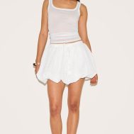 ae7299dcd831cf5c9cbff1c29569342853dba047_CNM0509_4_white_textured_tie_waist_detail_puffball_mini_skirt