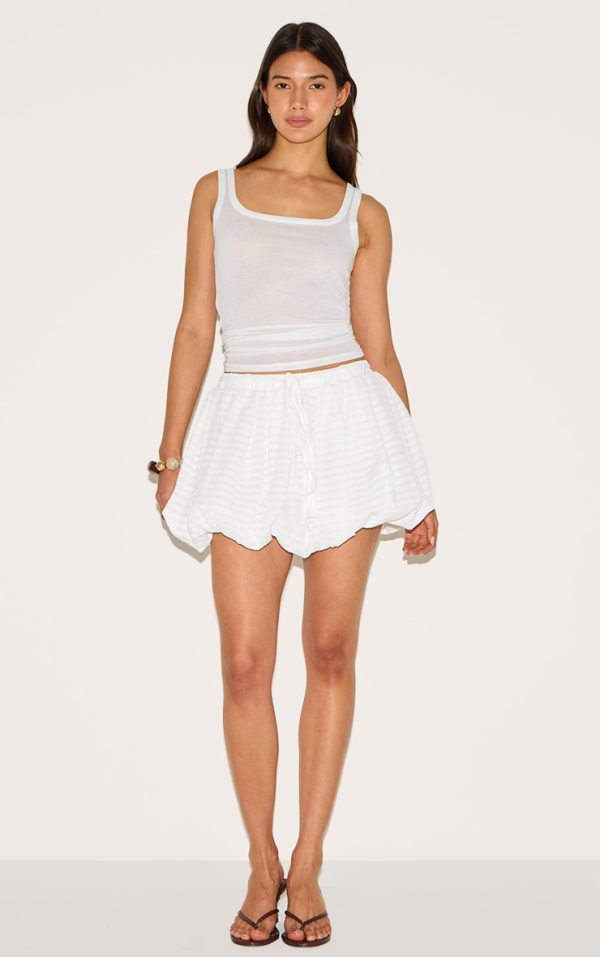 ae7299dcd831cf5c9cbff1c29569342853dba047_CNM0509_4_white_textured_tie_waist_detail_puffball_mini_skirt