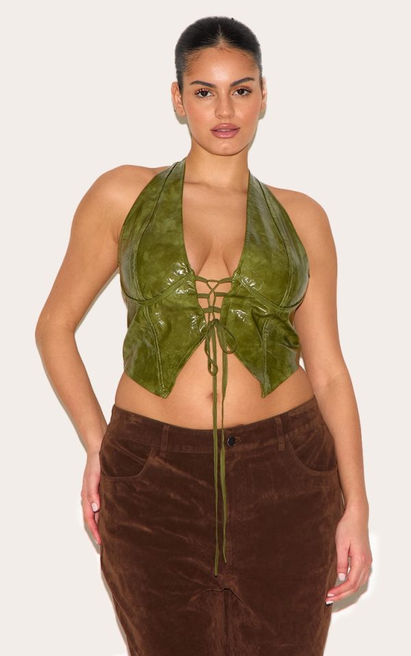 af98e022fbef28d3d6568a554e0d245c6660d84f_CNE0792_1_plus_olive_washed_faux_leather_lace_up_plunge_halterneck_top