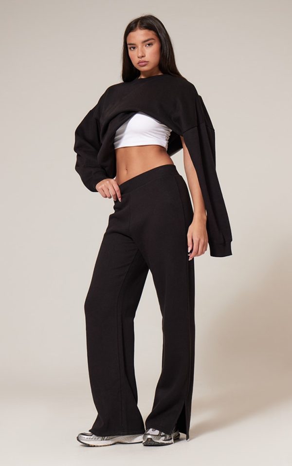 b015c63f3910c94351ece86cf2daab7f126e85a6_CNK5054_1_black_flared_split_hem_joggers