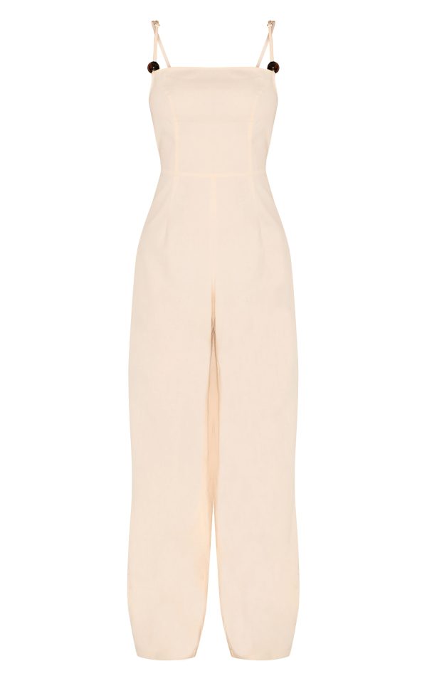 b0dc7be249738c07fc8e2a7b664fe0e5468dd2b3_CNM7291_5_natural_linen_blend_boat_neck_bead_detail_jumpsuit