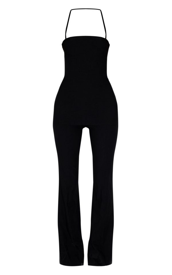b1197c0ecd03a13f062011177579578ee15ef894_CNL7235_5_black_woven_thin_halter_overlay_detail_jumpsuit