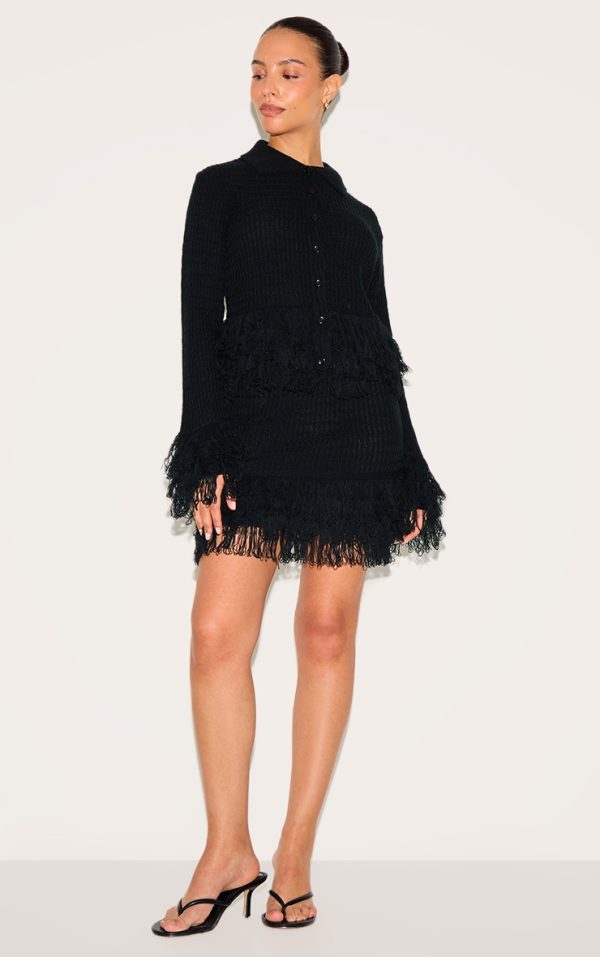 b1b4f433b16c32499997df3ae1f35de977a04585_CNN2571_1_petite_black_rib_fringe_hem_knit_skirt