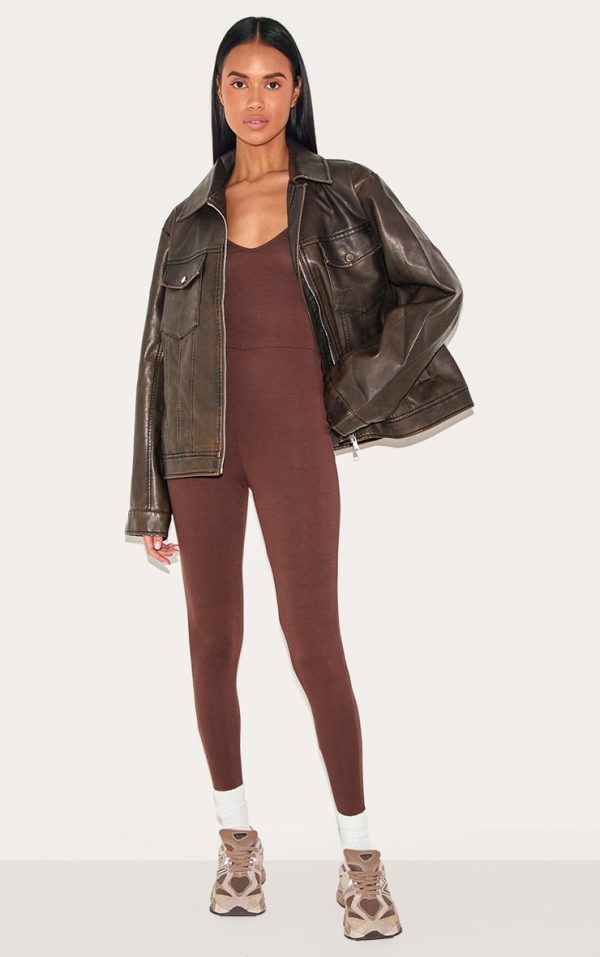 b29ca2cf24a00ba51ce76a8260444fbcf2519492_CMU5364_1_chocolate_basic_strappy_plunge_jumpsuit-1