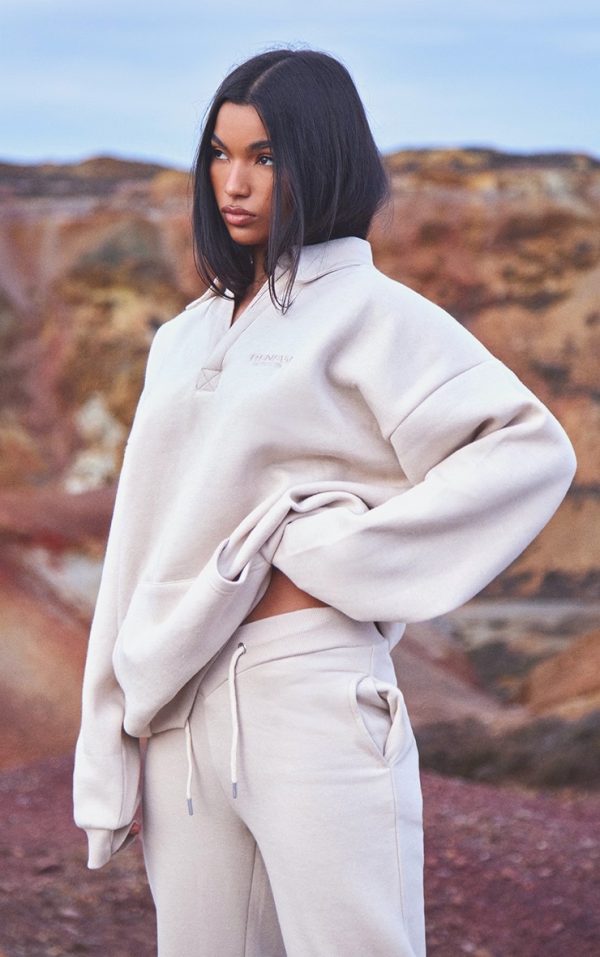 b5464cdd0a71e95afd26f42ece0f7fc5c0a87f00_CNE5452_1_oatmeal_embroidered_oversized_fit_collar_sweatshirt