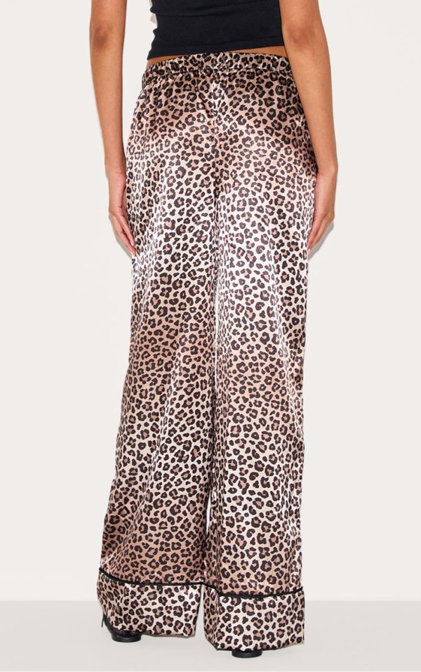 b646e884b4184fddbb8748c10ab18968924563a6_CNJ1925_3_leopard_printed_satin_wide_leg_trousers