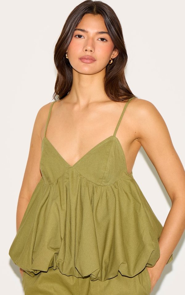 b66aa04b46866d7d1665f59594af9bff9b804cb2_CNM8873_1_olive_strappy_puffball_cami_top