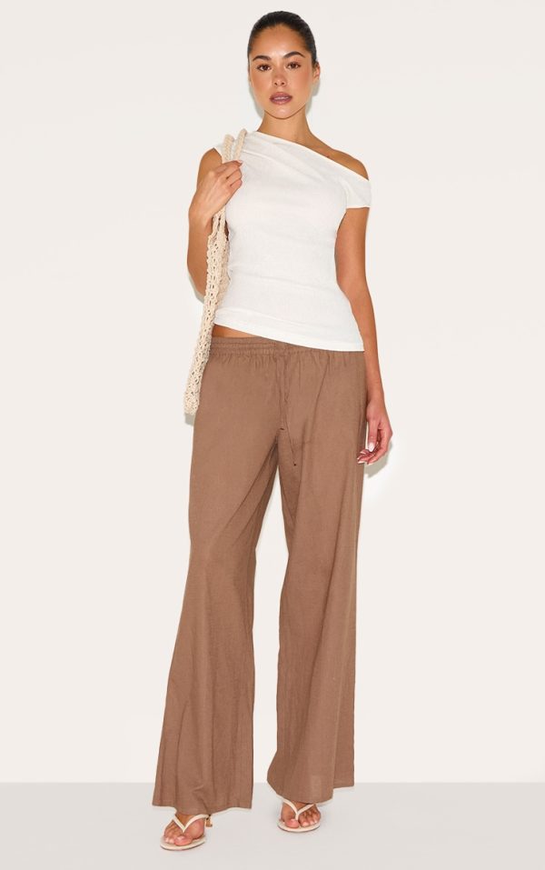 b7bb664cac643e890dc2c3544ae4f02c0dea3135_CNM8067_3_cream_textured_asymmetric_neckline_long_top