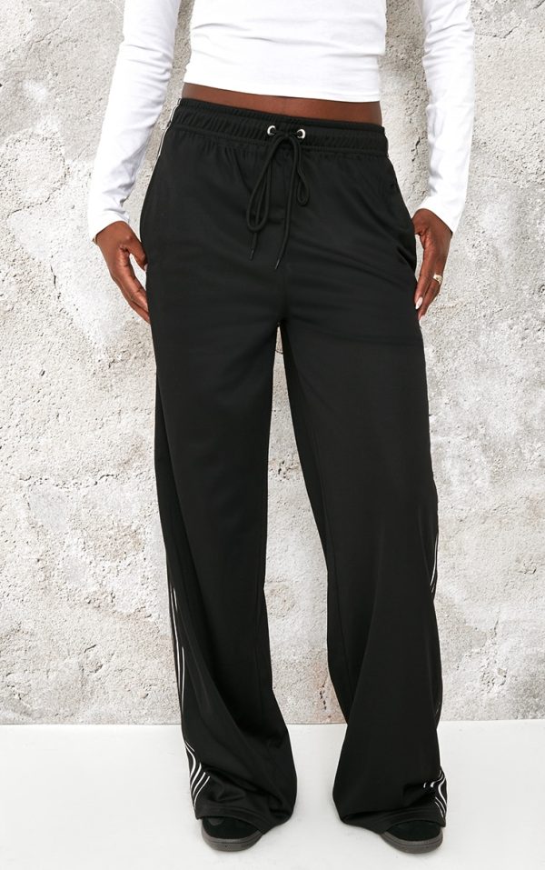 b84a2599a1c911b64262903e9eb548ef1acbf9ec_CNK7321_2_tall_black_tricot_side_stripe_wide_leg_joggers