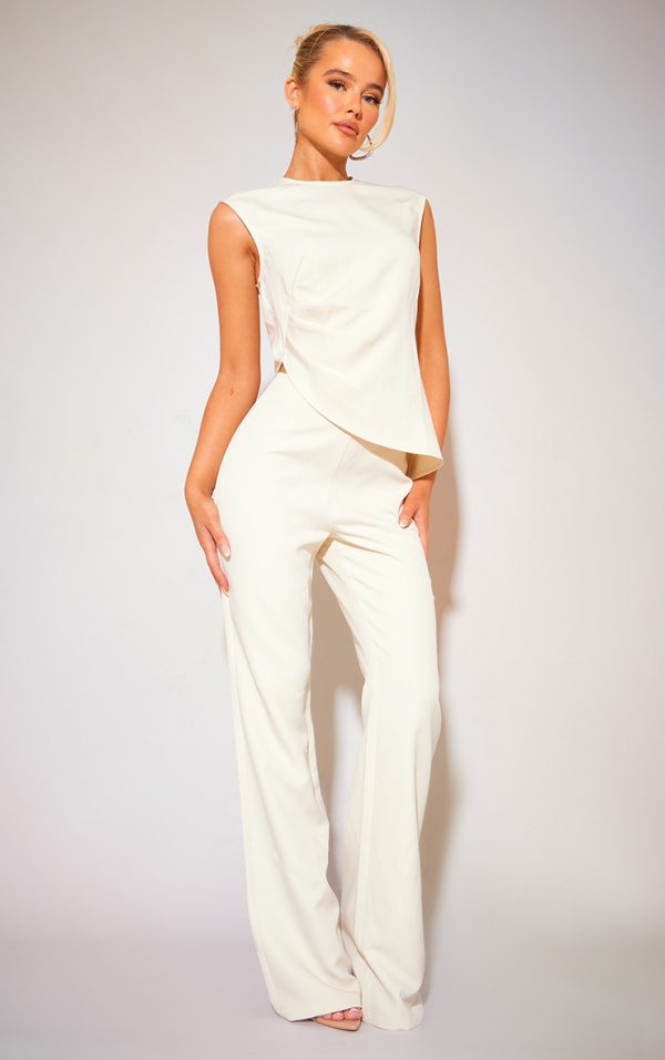 b84ccea3a576da49f26cccf6bcb4b18bbc0221a2_CNH3088_1_cream_tailored_low_rise_skinny_flared_trousers