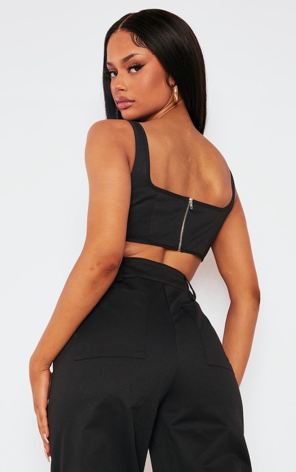 b86679e934bf669ea766689cdf2da739cce32cb5_CNA5647_2_black_twill_dip_hem_structured_cargo_corset-1