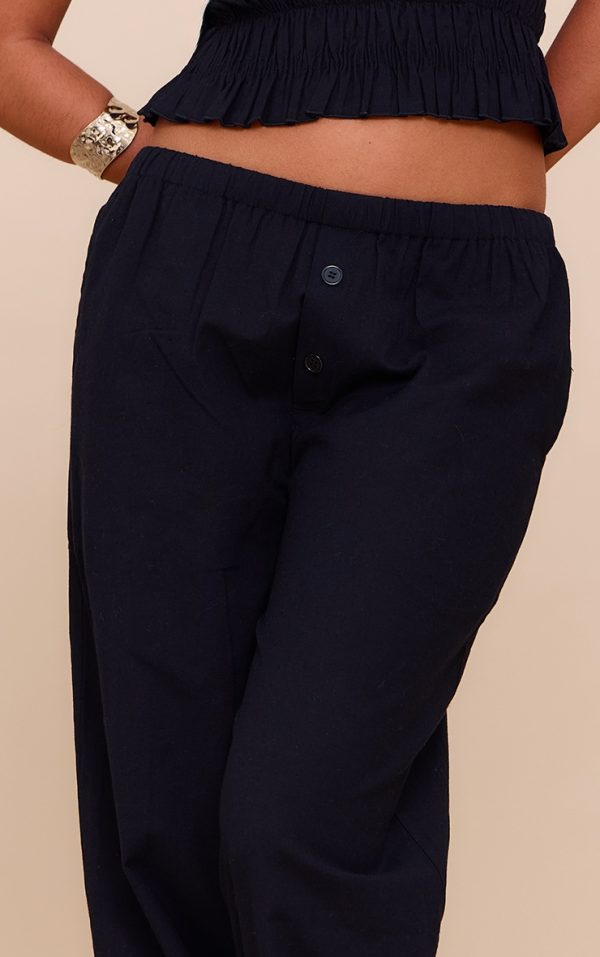 b87fbe6a84f656b62c274576fc1c75a3d33e84af_CNM6116_4_black_low_rise_wide_trousers