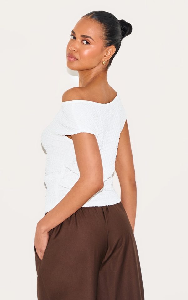 b8afbec9437731937e8f8447333df52e1ab09678_CNM4263_2_cream_textured_asymmetric_ruched_detail_long_top