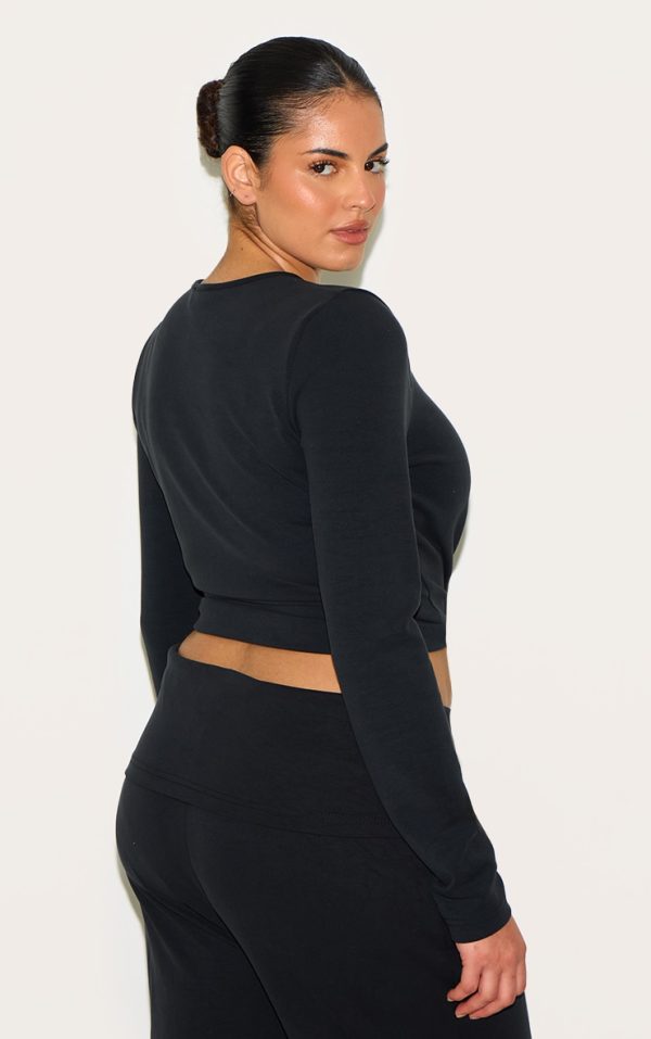 b938b7d0b50f5a68f80cb613e22d20bad9f589d9_CNM4453_2_plus_black_modal_button_detail_long_sleeve_top-1