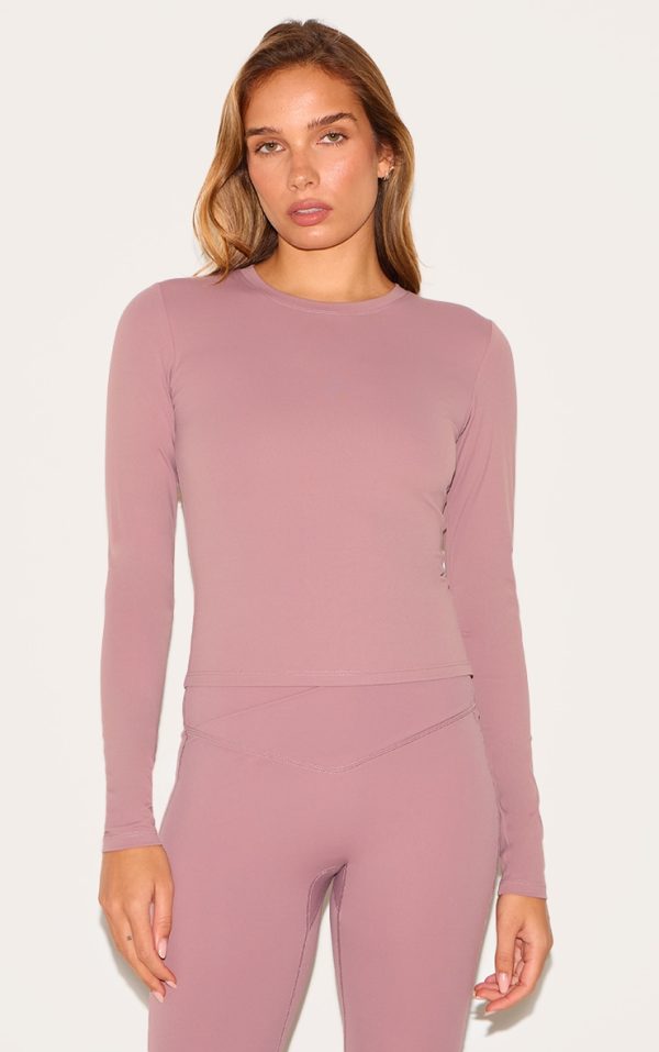 b9b89e6fb44fd7ce57a2db6fe5932bb855d11ba8_CNL7881_1_mauve_sculpt_long_sleeve_crop_gym_top-1