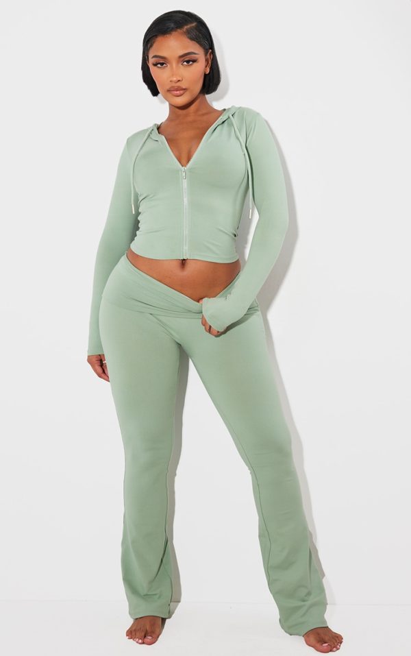 ba4f8f3c0f8ba8e93c5019674c39372de9026ecd_CNH4394_1_shape_sage_green_sculpted_foldover_waist_flare_trousers