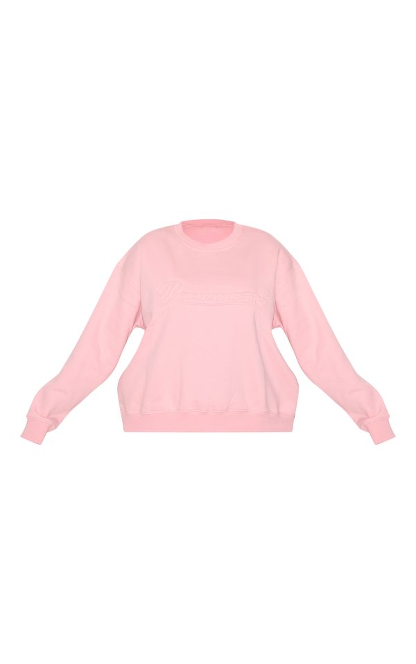 ba688d1447e2ea9e709ab87d28b71a0f4b70e107_CNK3401_5_plus_baby_pink_embossed_graphic_oversized_sweatshirt