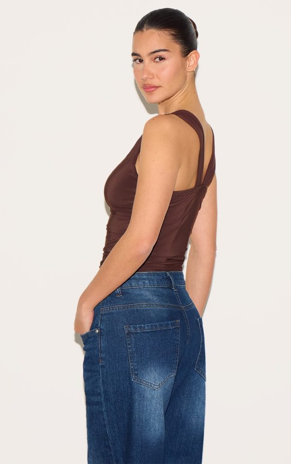 ba8cfb8d6019e22d4ccf531a1918adf337dc1547_CNM6696_2_chocolate_asymmetric_strap_detail_vest_top-1