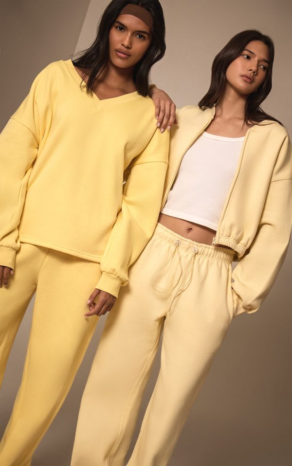 baad2ec781738585bcb48b5f92af749c65262235_CNM9984_3_butter_cream_drawcord_waist_cropped_zip_up_sweatshirt