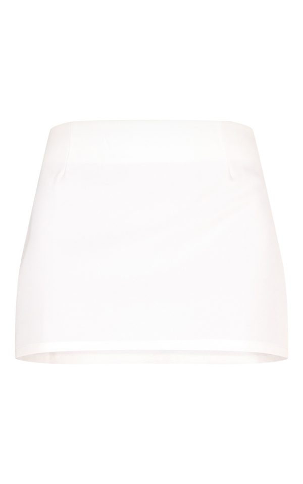 baed607f332672755bbe56c8fa04f0c67d627d7c_CNM1776_6_white_woven_mid_rise_mini_skirt