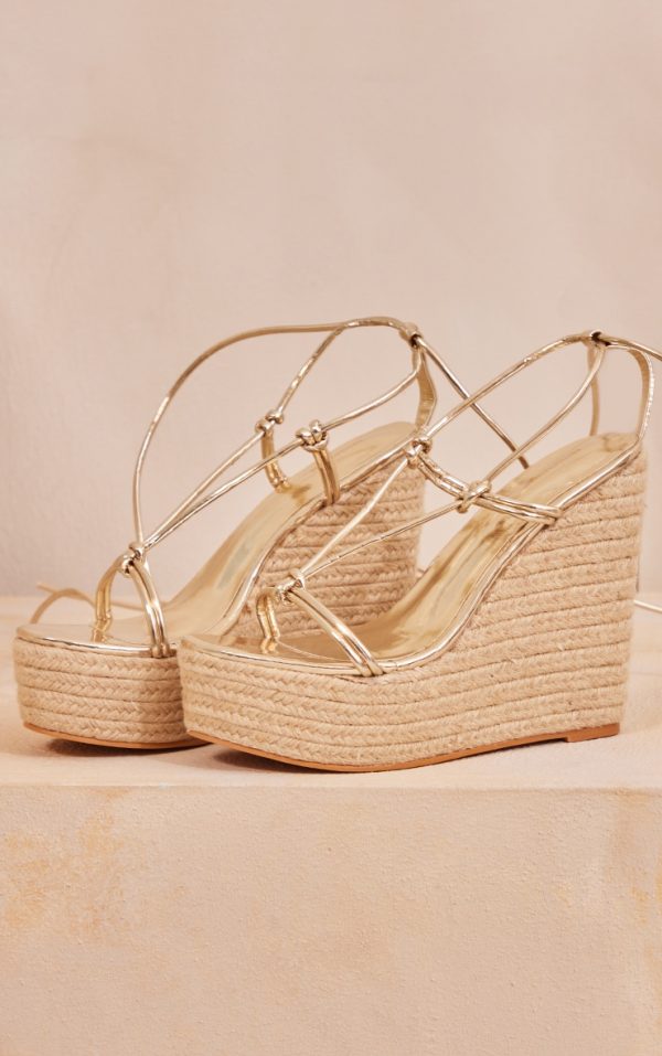 bb11300c1b35b28ce24f4a5a4be42d7e5c901b8f_CND0635_3_gold_pu_metallic_twist_strap_lace_up_high_heeled_espadrille_wedges