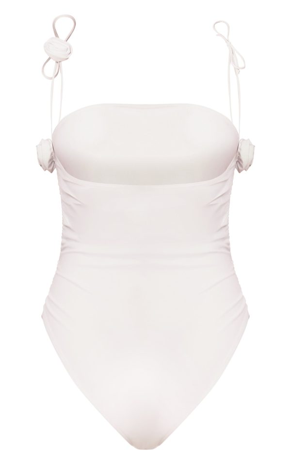 bbaf4573d2b3009e3d0413eda0971f77b6079a4d_CNM6873_6_white_ruched_flower_trim_swimsuit