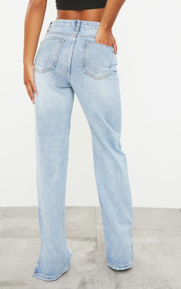 bc42908a0996119aa81e68e9373b2afb5b39b1ec_CMK8461_3_light_blue_wash_ripped_split_hem_straight_leg_jeans