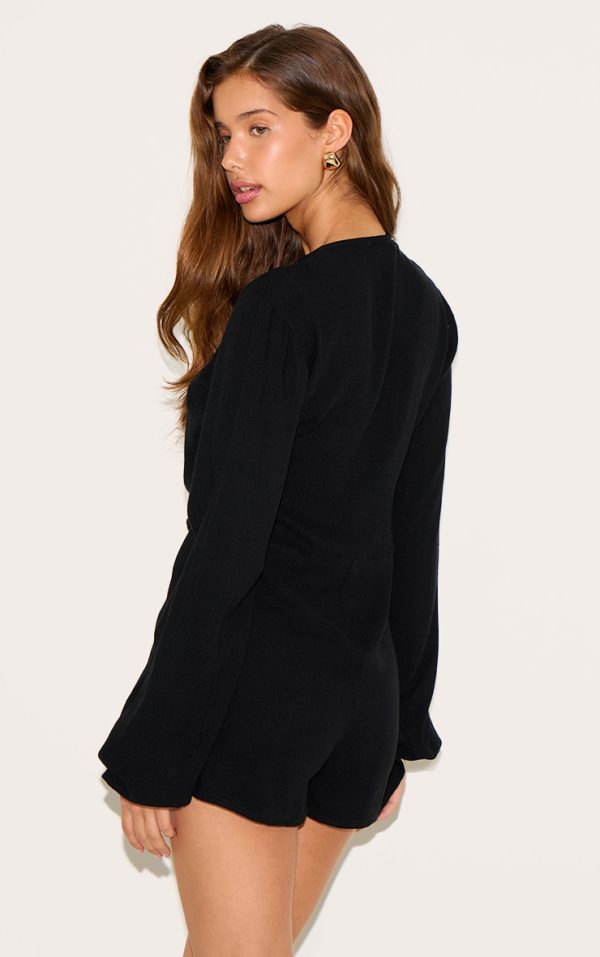bd0f707e1a753c761046e4c56b12782069a25687_CNM7961_2_black_long_sleeve_plunge_twist_detail_playsuit