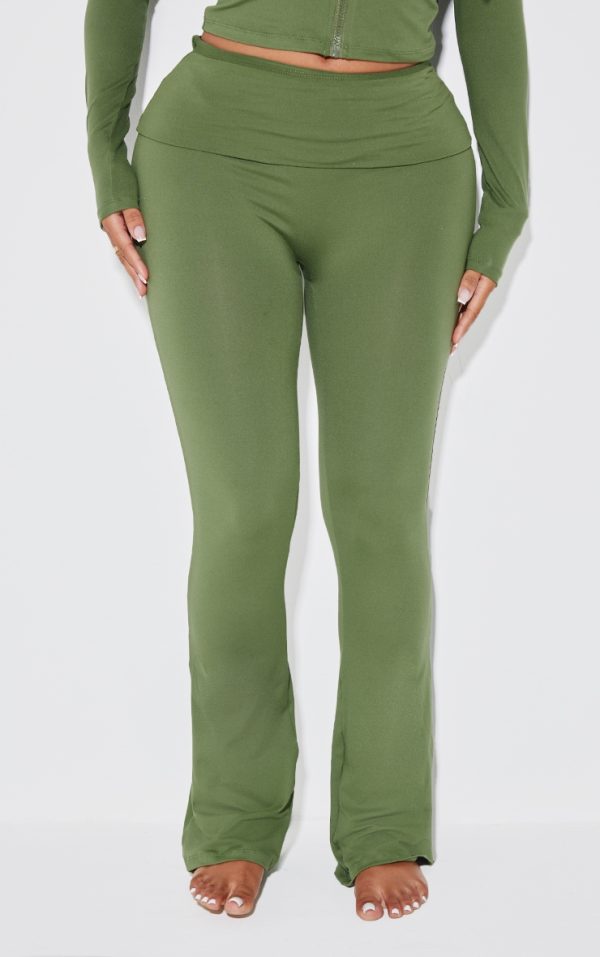 bd347596a4b251a0e4f0be3b2cf44c9ffdd76723_CNJ7933_2_shape_khaki_sculpted_foldover_waist_flare_trousers-1
