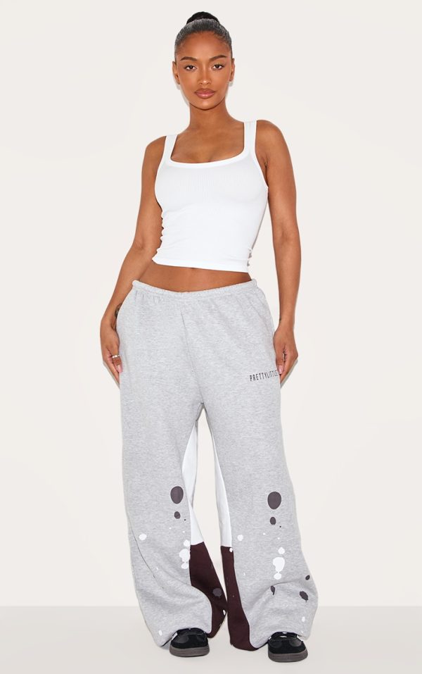 bdb3cf4c35391133f67070adaf066ac842df19ec_CNK2552_1_shape_grey_marl_printed_paint_splat_detail_wide_leg_joggers