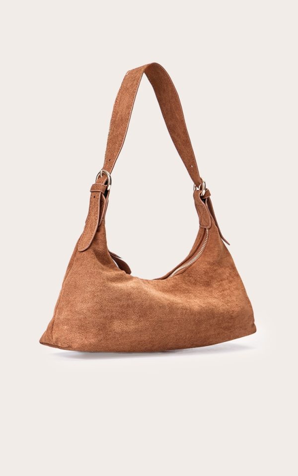 be30d4a9e2c681270a7dd649ab3b602c1b6a232b_CNM3902_2_tan_suede_elongated_curved_shoulder_bag