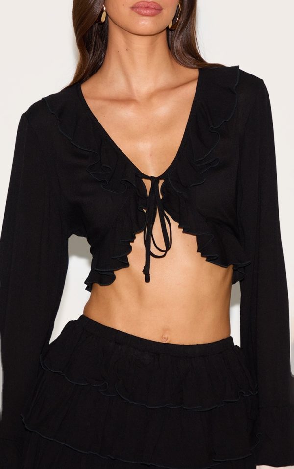 bebb8700ba92de4b0f9a286cfc8ee7df12a7c964_CNM3228_4_black_cheesecloth_ruffle_tie_front_long_sleeve_top