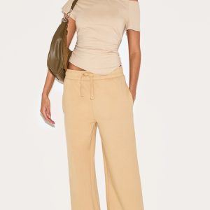 Stone Interlock Wide Leg Split Hem Joggers