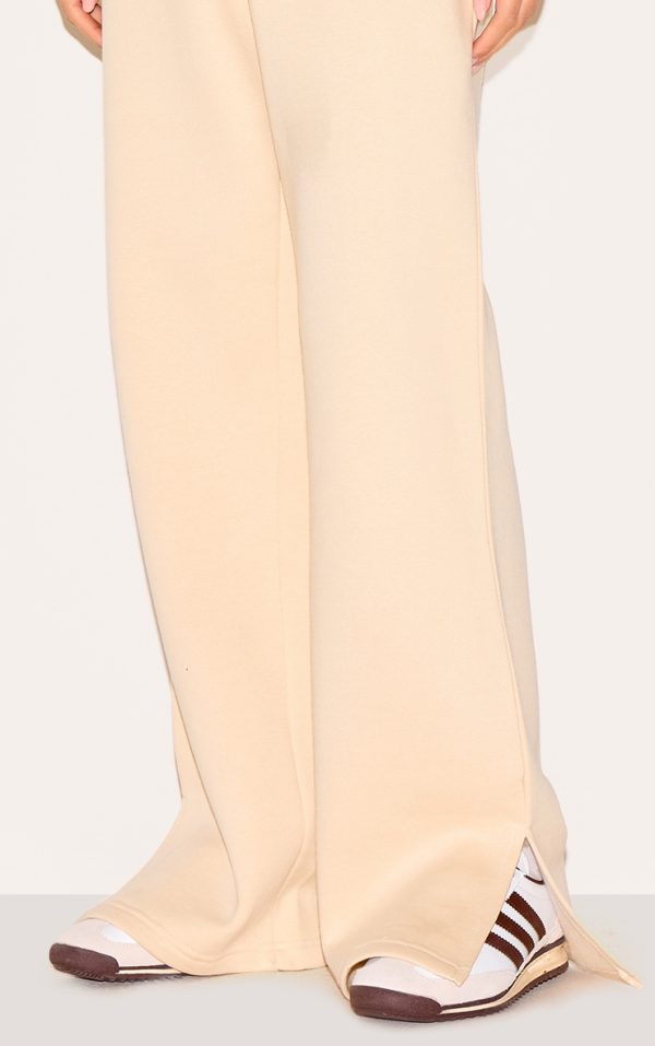 bfe034c4c0b5e614213df4fe62f558f3aa96696e_CNM5189_4_stone_split_hem_flared_joggers